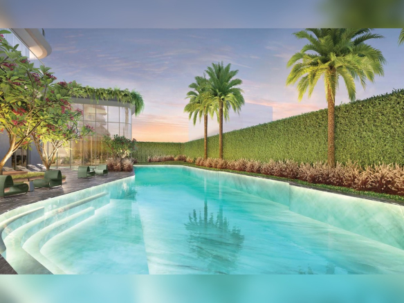 Piscina descoberta do Epic Jardim Europa em área ajardinada
