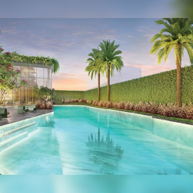 Piscina descoberta do Epic Jardim Europa em área ajardinada